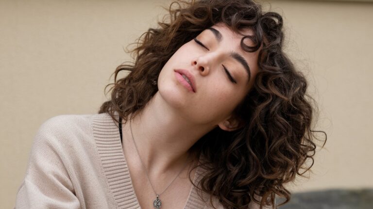 How to Get Rid of Frizzy Curly Hair: 12 Expert Solutions